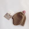 Otoño e Invierno Bebé 6-12 meses gorro con orejeras de estilo occidental que combina con todo color sólido 1-2 años bebé niño y niña gorro de lana de punto