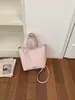 Bolso tipo cubo de moda coreana ins para mujer 2026, bolso de hombro simple y versátil, bolso cruzado casual de alta gama para mujer