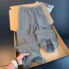 Pantalones jacquard de patrón oscuro retro americano para hombre, marca de tendencia de otoño, pantalones casuales holgados, de caída suave, pierna recta ligeramente acampanados