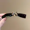 Pinza para el pelo de plátano con lunares estilo coreano para mujer, versátil y simple, nuevo modelo 2026, moderno y elegante, pinza para el pelo de alto valor estético