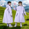 Impermeable infantil para niños y niñas, impermeable y a prueba de lluvia de cuerpo completo, diseñado específicamente para estudiantes de preescolar y primaria con espacio para mochila