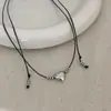 Colar Pingente Coração de Corda de Couro Preto Estilo Kim Taeyeon para Mulheres Estilo Coreano Nicho Retro Corrente para Clavícula