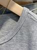 2025 Nuevo Verano Estilo Coreano Versátil Moderno Asimétrico Hombro Derecho Descubierto Clavícula Expuesta Camiseta de Manga Corta Top para Mujer
