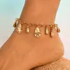 Europa y Estados Unidos pulsera de tobillo con borlas estilo playa oceánica de joyería transfronteriza pulsera de tobillo con gotas de agua perla pluma concha adornos para el pie femenino niña