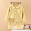 Nuevo conjunto de pijama de manga larga para niños de otoño e invierno 2026, con un conjunto de dos piezas engrosado y forrado de polar con cuello de solapa, adecuado tanto para niños como para niñas