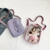 Bolsito pequeño lindo femenino nuevo estudiante chica bolso de mensajero portátil gran capacidad JK bolso de dolor de moda chica suave transparente bolso de bebé