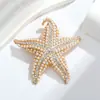 Broche de estrella de mar con perlas y explosiones transfronterizas, moderno, sencillo, brillante, con diamantes de imitación, para fiesta, accesorios de vestir