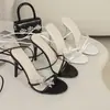 Sandalias de Tacón Alto con Punta Redonda y Rayas Nuevo Estilo Transfronterizas 2025 con Elegante Mariposa Flor Cruzada de Atar Sandalias de Tacón Ultra Alto