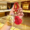Llavero de Oro Año de la Oveja Ten Dinero para Gastar Llavero de Teléfono de Oveja Pequeña Colgante para Bolso Caja de Regalo de Año Nuevo Controlador de Tráfico de Transmisión en Vivo