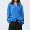 No Processo de Produção: Cardigã de Tricô Simples Estilo Francês com Gola Lapela, Mangas Caídas Soltas, Bolsos e Design de Botões Únicos. Peça de Tricô Versátil