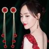 Pendientes de lazo de terciopelo rojo con ambiente de moda, temperamento femenino, flor dulce, borla larga, pendientes Joker al por mayor