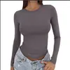 2026 Amazon nueva camiseta básica versátil de manga larga con cuello redondo, corte ajustado, estilo europeo y americano, para primavera y otoño, color liso, corte ajustado para mujer