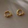 Pendientes circulares de aguja de plata 925 para mujer, nuevos diseños de nicho personalizados, sin dormir, estilo ins de alta calidad, con hebilla de oreja con nudo.