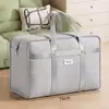 Bolsas de almacenamiento de tela no tejida engrosada para uso doméstico, adecuadas para guardar ropa y ropa de cama, a prueba de polvo y humedad, plegables, ideales para mudanzas, uso en dormitorios y para empacar y almacenar artículos.