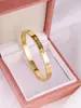 Pulseira com Design de Trevo de Quatro Folhas em Aço Titânio, Fivela Tipo Fecho, Banhada a Ouro 18K com Diamante Inlaid, Modelo Mais Vendido Internacionalmente