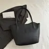 Bolsa Tote Grande de Couro Estilo Coreano Nicho para Mulheres Nova Coleção Primavera 2026 Bolsa de Mão Moda para o Trabalho Simples Casual