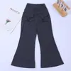 Pantalones cargo acampanados negros para niña para otoño, adecuados para la escuela y para usar al aire libre. Pantalones cargo de tiro alto para niños, adelgazantes, con un ligero acampanado, disponibles en stock