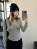 Camiseta Henley de manga larga estilo coreano para mujer, adecuada para primavera, otoño e invierno, con corte relajado, estilo casual y se puede usar como capa exterior o como capa base adelgazante