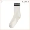 Calcetines Zhuji para mujer, otoño e invierno, color liso, transpirables, desodorantes, caña larga, estilo universitario, ins, deportivos, versátiles, calcetines de moda negros a rayas