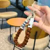 Lanyard Trenzado para Teléfono Ins de Moda Correa de Muñeca Dopamina Llavero de Cámara CCD Accesorio Correa Anti-Pérdida