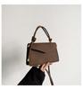 Bolso Sencillo de Color Sólido Versátil de Moda para Mujer 2026 Invierno Nuevo Bolso Cuadrado Pequeño Bolso Cruzado de Mano con Costuras