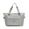 Bolsa deportiva portátil de gran capacidad transfronteriza para fitness, bolsa de viaje diagonal de corta distancia para mujer, bolsa de hombro repelente al agua para yoga, venta al por mayor