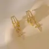 Brincos de Moda Europeus e Americanos de Venda Quente Transfronteiriça com Borlas Irregulares Incrustados de Zircônia Joia de Orelha de Latão Galvanizado com Ouro Real