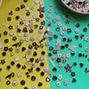 Metal sentido plateado flor amor cara sonriente estrella de cinco puntas accesorios de joyería cargador funda de teléfono móvil material venta al por mayor
