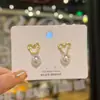 Pendientes Casuales de Perlas Angora Rojo Aguja de Plata Estilo Socialité Pendientes Diarios de Nicho Más Fáciles de Combinar con el Agujero del Oído