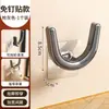 Estante para pantuflas de baño, tipo ventosa, montado en la pared sin taladro, especial para baños, modelo nuevo, escurridor con ganchos y estante de almacenamiento
