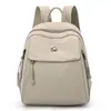 Comercio Exterior Exportación Mini Mochila Escolar para Mujer Ocio Viaje Mochila Pequeña Impermeable Tela de Nylon Mochila Venta al por Mayor Transfronteriza