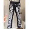 Jeans de comercio exterior para hombre con salpicaduras de pintura, corte slim, graffiti moderno, rotos artificiales, elásticos, con parches, pantalones de pierna ancha ligeramente acampanados