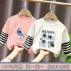 Camiseta de manga larga de algodón puro para niño, nuevo modelo primavera y otoño 2026, camiseta básica con estampado de dibujos animados para niño, top falso de dos piezas, moderno