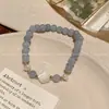 Pulseira com Contas de Concha de Camélia Água-Marinha para Mulheres Design de Nicho Versátil de Alta Qualidade Joia de Mão para Estudantes Melhores Amigos
