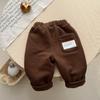 Pantalones gruesos de invierno estilo coreano estilo occidental con forro de polar para bebé, hombres y mujeres, pantalones cálidos de terciopelo de color liso de una pieza para otoño e invierno de bebé