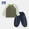 Camiseta de Manga Larga de Algodón Puro para Niño Estilo Europeo Ropa Infantil Mangas Raglán Nuevo Estilo 2026 Niños Bebé Estilo Primavera/Otoño Capa Base Moderna