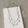 Collar Apilado de Doble Capa de Acero de Titanio con Cuatro Estrellas y Borlas de Gota de Agua, Cadena Clavicular de Lujo Ligero y Alta Gama, Cadena para Suéter con Colgante de Estrella