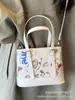 Bolsas de Nicho de Alta Gama para Mujer 2025 Nueva Moda Tendencia Versátil Bolso de Hombro Cruzado Bolso Cubo de Mano de Lujo Ligero