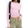 Moda feminina europeia e americana, nova camiseta de primavera, camiseta básica lisa de gola redonda, top justo de manga comprida para mulheres