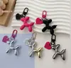 Llavero de cadena de lazo simple hecho a mano con cuentas, corazón de niña lindo, colgante de amor