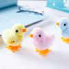 Agita el mismo estilo de pollo enrollable simulación animal felpa pollo saltarín puesto nostálgico juguetes para niños al por mayor