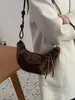 Yuezizhi 2026 principios de otoño nuevo bolso versátil de moda con estampado de leopardo bolso cruzado casual simple retro tipo dumpling bolso de cuerno