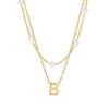 Suministro Transfronterizo Lujo Accesible Collar de Acero Titanio de Alta Gama Perla Colgante 26 Letras Collar Apilable Cadena Popular para Clavícula