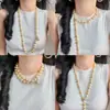 Otoño e Invierno Estilo Maillard Dorado Alto Brillo Perla Shijia Múltiples Formas de Usar Cadena de Suéter Cadena para Clavícula para Mujeres