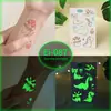 Pegatinas de Tatuaje de Dibujos Animados para Niños, Mundo de Dinosaurios Luminoso, Pegatinas Temporales Impermeables para Cara de Niños y Niñas, Stock Listo Transfronterizo
