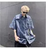 2026 Camisa Retro Hombre Verano Estilo Hong Kong Estudiante Holgada Nicho Sentido del Diseño Divertida Nueva Ropa para Hombre Top Abrigo