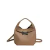 Bolso Cubo Retro para Mujer Gran Capacidad Diseño de Nicho Bolso Versátil de Moda para Mujer 2025 Nuevo Bolso de Hombro Cruzado de Moda