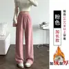 Pantalones de mujer de pierna ancha, holgados, a la moda y casuales, de cintura alta, con finas rayas, bolsillos y un diseño de pierna recta y fluido, hechos de terciopelo de algodón, para otoño e invierno 2026