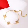 Collar Pulsera Aretes Sencillos Cruz Flor de Cuatro Hojas Circonita Acero de Titanio Set Accesorios de Regalo Dulce y Fresco de Alta Gama