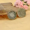 Accesorios de joyería al por mayor 26 mm reloj redondo marca retro DIY colgante hecho a mano accesorios de aleación
